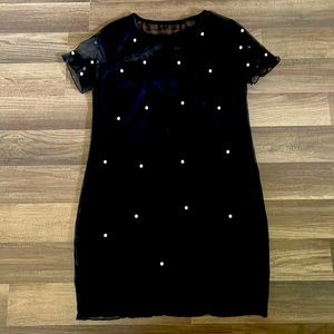 Womens black dress with pearls. Size medium. From forever 21